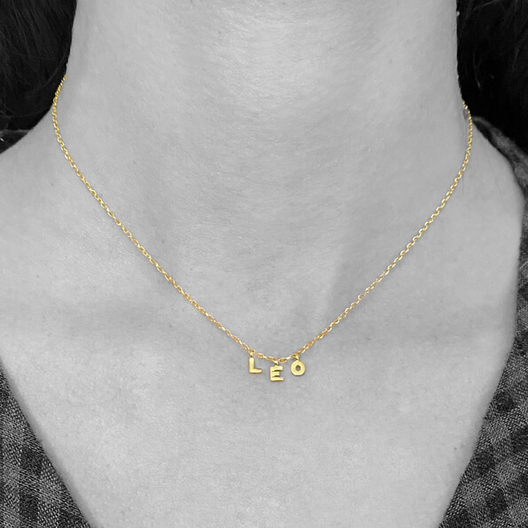 Micro initials name necklace in 18kt solid gold